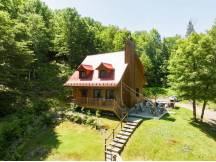 Laurentian wood cabin-king size suite-4 season spa
 thumbnail 2