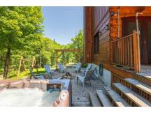 Laurentian wood cabin-king size suite-4 season spa
 thumbnail 37